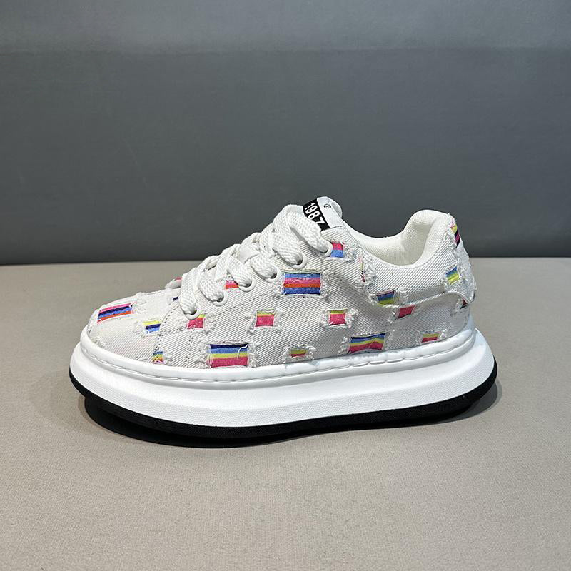 Ripped and patched canvas casual sneakers